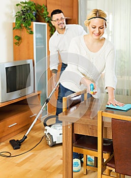 Family dusting and hoovering