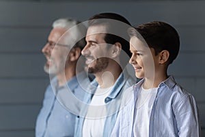 Family dynasty of 3 diverse males stand in line together