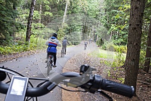 Family E-biking near Whistler Village, BC