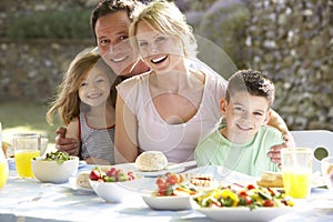 Family Eating An Al Fresco Meal