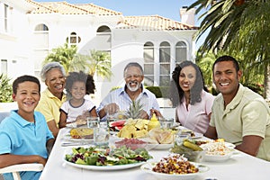 Family Eating An Al Fresco Meal