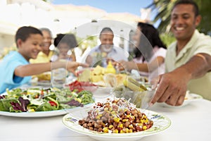 Family Eating An Al Fresco Meal