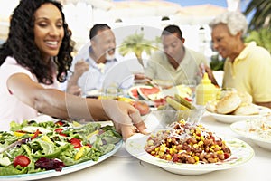 Family Eating An Al Fresco Meal