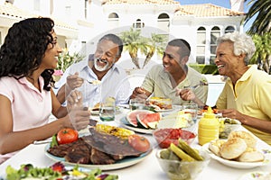 Family Eating An Al Fresco Meal