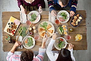 Family Eating at Dinner Table