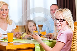 Family eating lunch or dinner