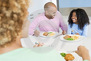 Family Eating A meal,mealtime Together photo