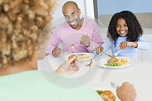 Family Eating A meal,mealtime Together