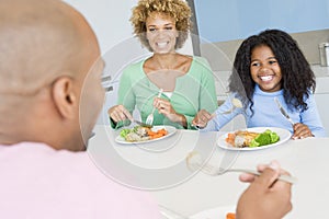 Family Eating A meal,mealtime Together