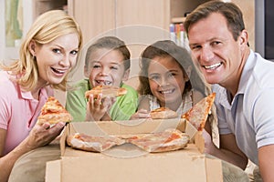 Family Eating Pizza Together