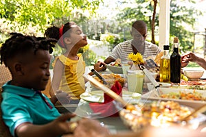 Family eating together at table