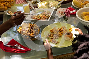 Family eating together at table