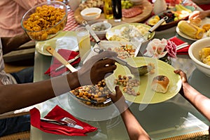 Family eating together at table