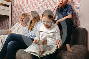 Family Engaged in Storytime at Home photo