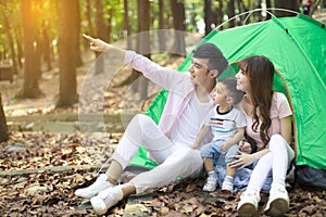 Family Enjoy Camping Holiday In Countryside