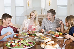 Family Enjoying meal, mealtime Together photo