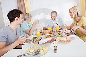 Family enjoying a meal together