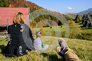 Family enjoying a mountain autumn landscape