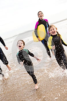 Family Enjoying the Surf