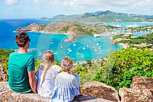 Family enjoying the view of picturesque English Harbour at Antigua in caribbean sea