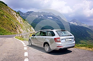 Family estate car in swiss alps