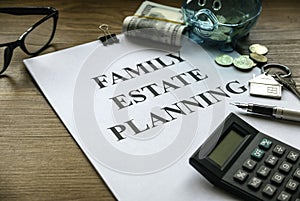 Family estate planning. Property investment and house mortgage financial real estate concept. Document, money, calculator, glasses