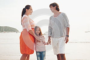 Family on the evening beach