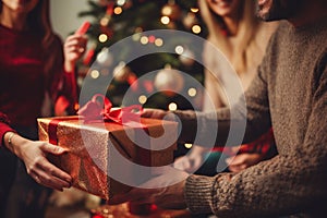 A family exchanging beautifully wrapped gifts in front of a festively decorated Christmas tree, capturing the essence of sharing