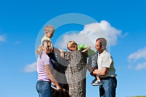 Family on excursion in summer