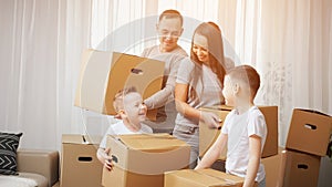 Family explores new apartment and gets ready to move