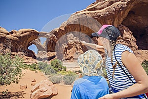 Family exploring together in Arches National Park