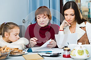 Family faced financials troubless, sitting with bills