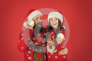 We are family. family holiday fun. small girl and dad red background. merry christmas everyone. Greeting xmas tradition