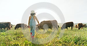 Family, farming and countryside farmer with girl child pointing, showing care, and learning about cows, cattle or