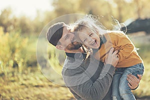 Family. Father and daughter. Leisure at sunset