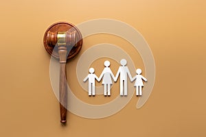 Family figure with judge gavel. Family law concept