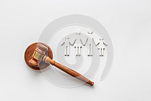 Family figure with judge gavel. Family law concept