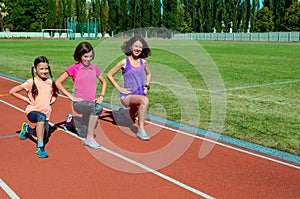 Family fitness, mother and kids training on stadium, sport with children
