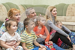 Family on floor by the couch