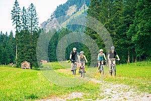 Family Of Four Cycling