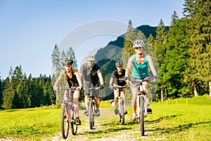 Family Of Four Cycling