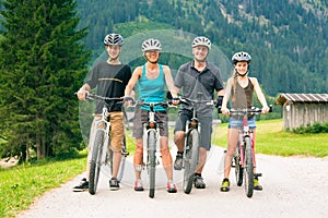 Family Of Four Cycling