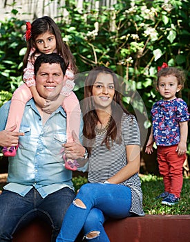 Family of four in park