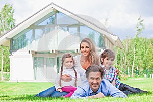 Family in front of house