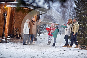 Family gathering together for Christmas eve