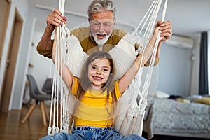 Family, generation love and people concept. Happy grandparent having fun with children at home