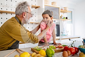 Family, generation love and people concept. Happy grandparent having fun with children at home