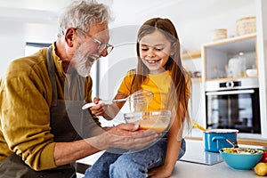 Family, generation love and people concept. Happy grandparent having fun with children at home