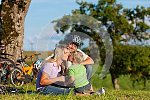 Family on getaway with bikes