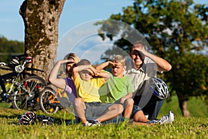 Family on getaway with bikes